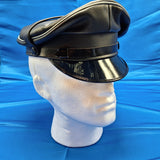 Muir cap with gray piping around upper edge