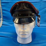 Muir cap with red piping around upper edge